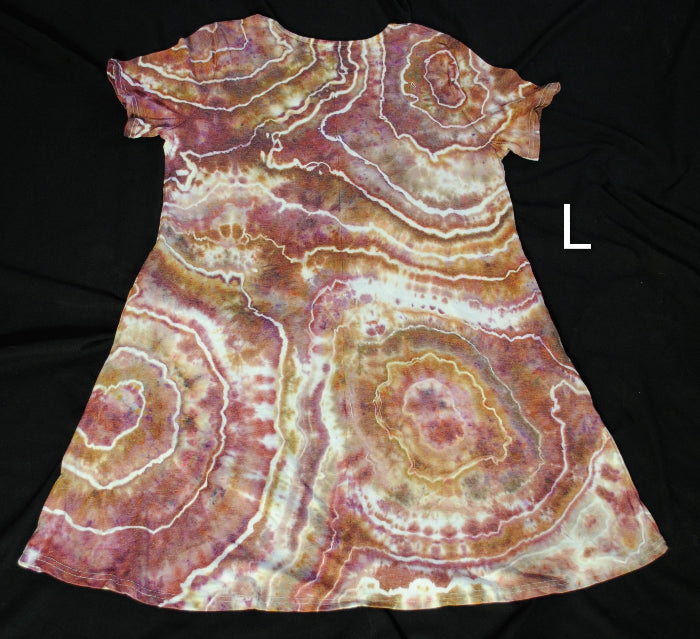 A short-sleeve A-line dress with a brown, pink, and cream agate stone pattern, laid flat on a black background with a white letter 'L' on the right side.